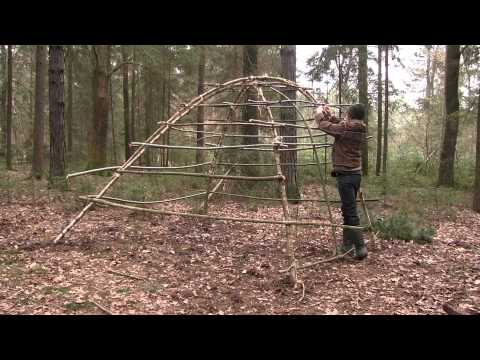 Building A Stone Age Hut As Survival Shelter