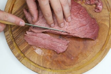 slicing meat thinly