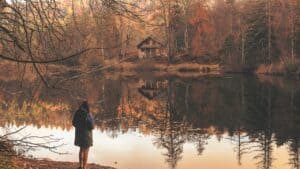 woman alone by the lake
