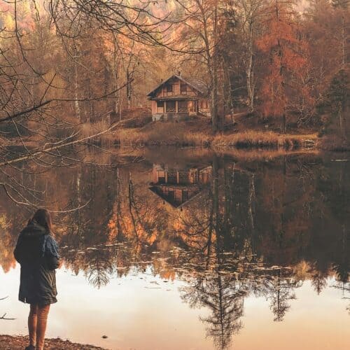 woman alone by the lake