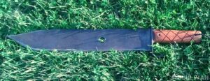 finished DIY machete in grass