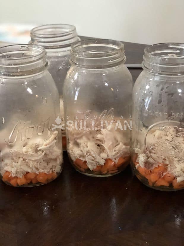 boiled chicken in mason jars with carrots