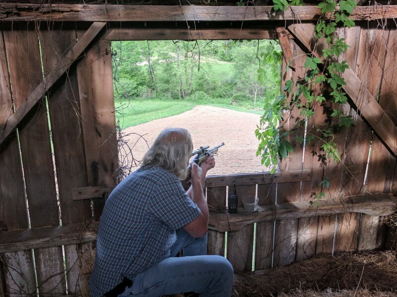 bobby shooting a gun defending his location