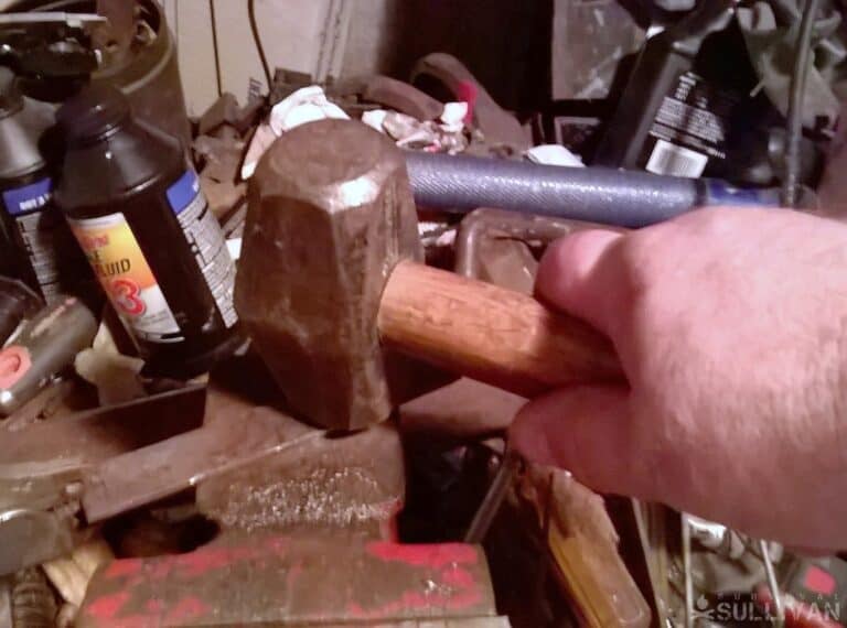 hammering piece cut out from handle flat to make hilt