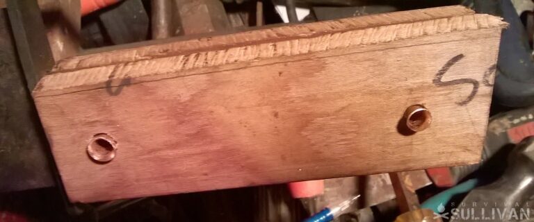 rough cut handle scales with copper tube rivets started