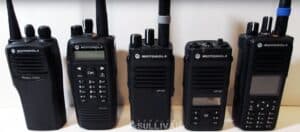 several Motorola walkie-talkies