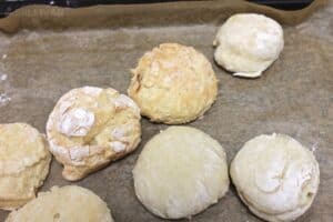 the buttermilk biscuits are on the left and more golden in color