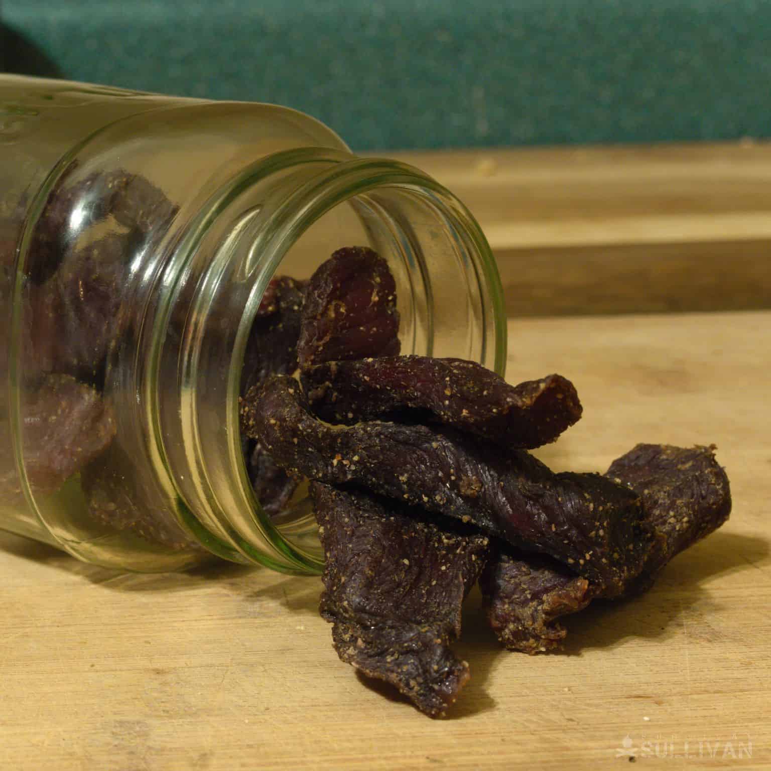 dried beef in oven spilling out of glass jar