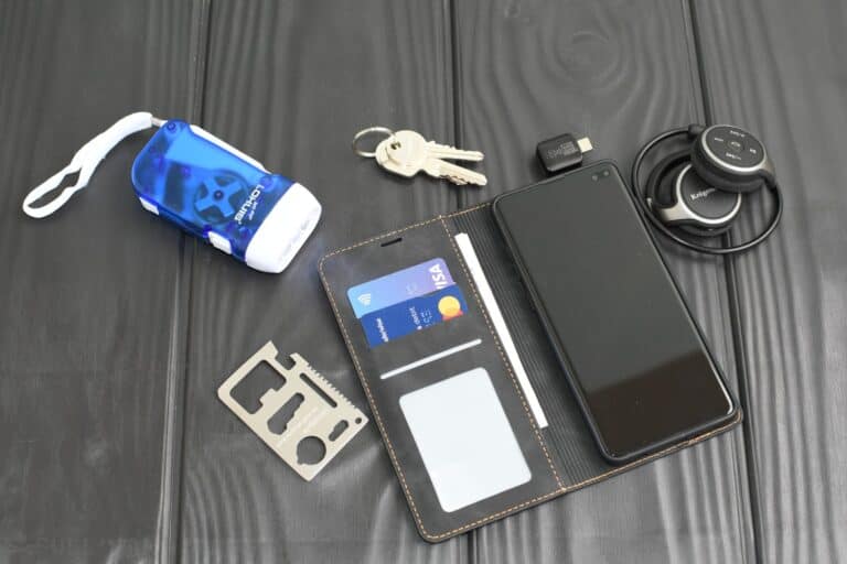 edc kit phone extra battery multitool flashlight