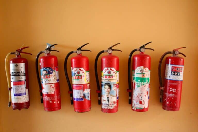 six fire extinguishers