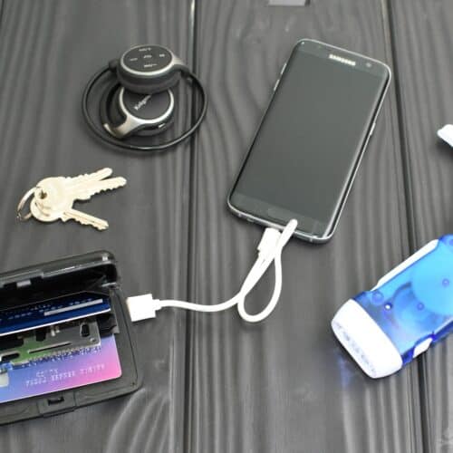 urban EDC kit phone card holder extra battery hand-crank flashlight keys headphones