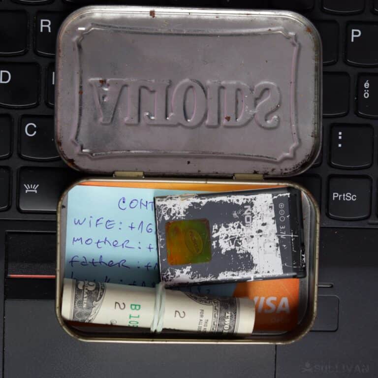 cash and communication emergency kit in Altoids tin