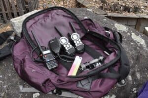 Baofeng HAM radio, walkie-talkies, flashlight and two chemlights