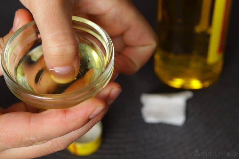 dipping thumb in cooking oil to help remove a splinter