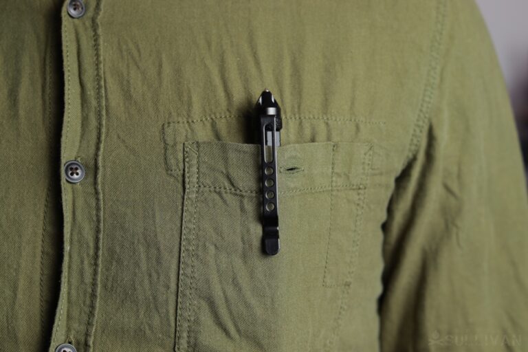 tactical pen inside green front shirt pocket