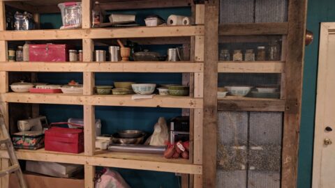 DIY pantry shelves with various items stockpiled