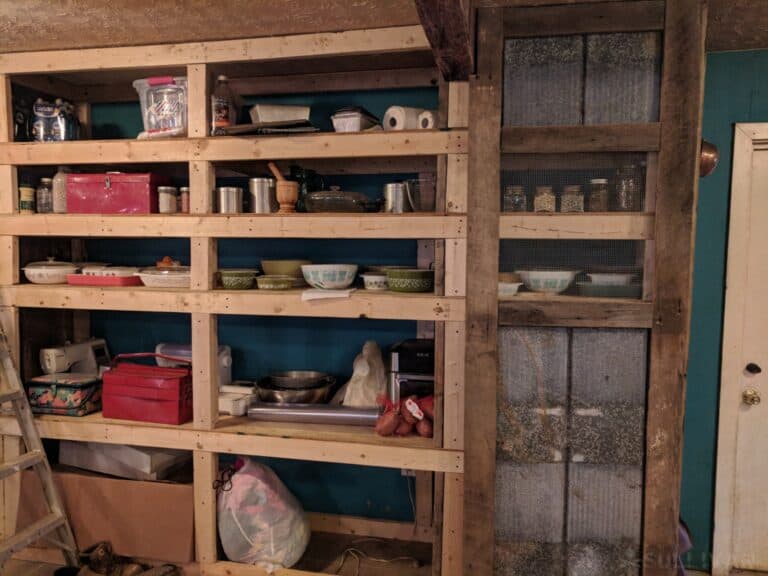 DIY pantry shelves with various items stockpiled
