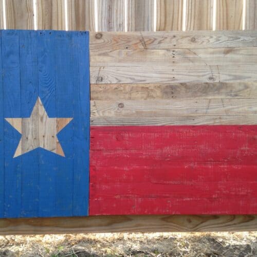 flag of Texas on a wooden board