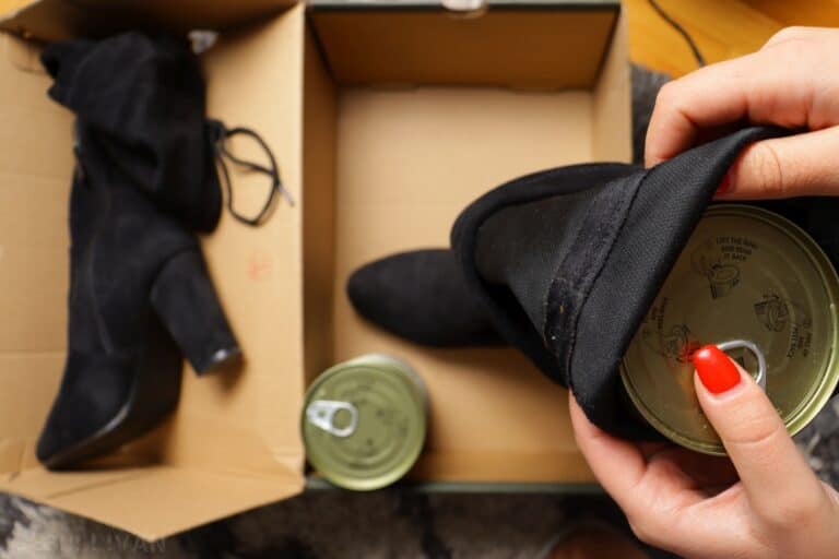 storing cans of food inside women's tall boots