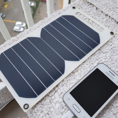 two-portable-solar-panels-charging-a-phone