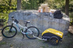 bike with trailer attached and survival supplies