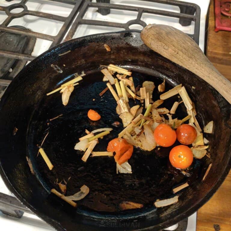 cooking cattail in cast iron