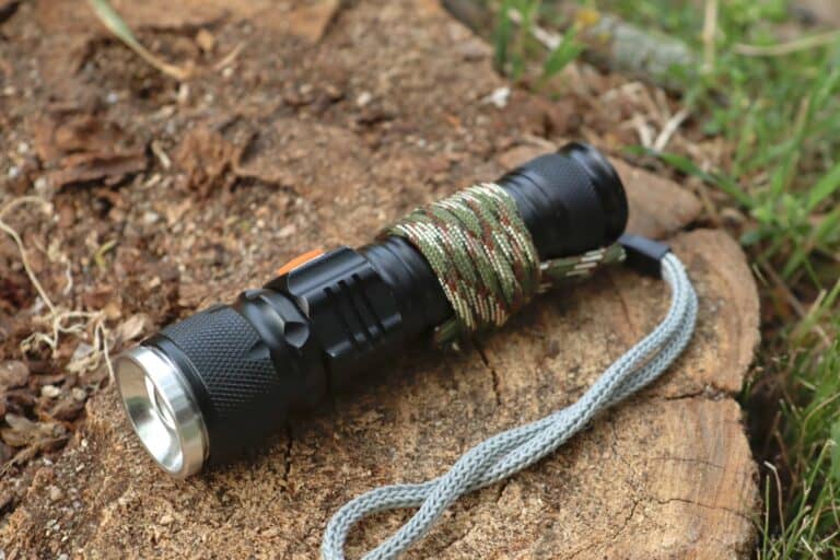 flashlight with paracord wrapped around it