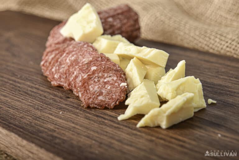 plate of cheese and cured salami