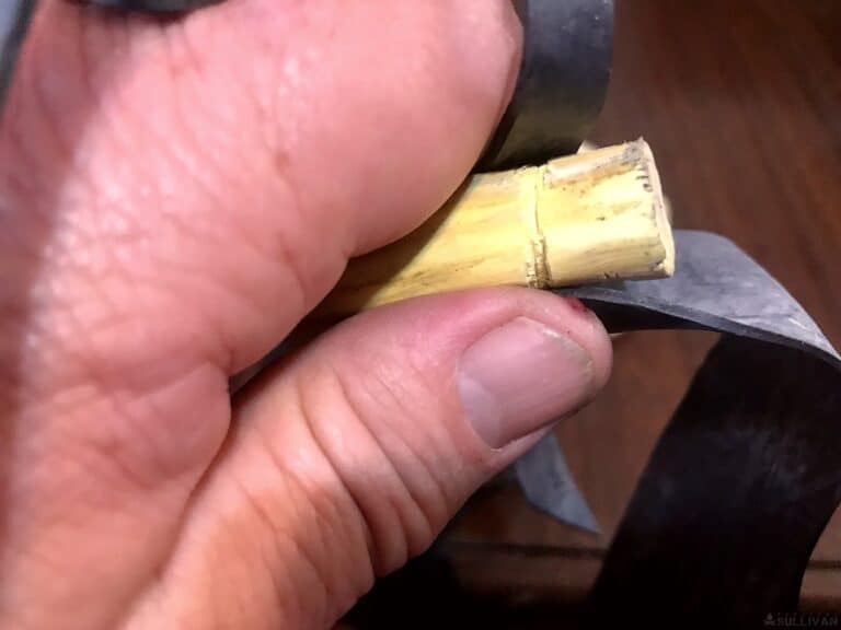attaching rubber band to the fork