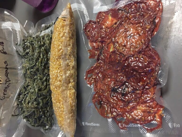 corn and dried meat inside airtight sealed bags