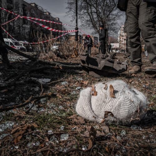 knitted hat lying among debris in Ukrainian city