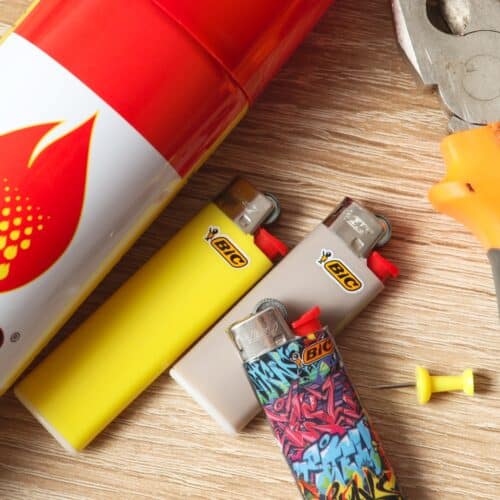 Bic lighters, lighter fluid, and pliers