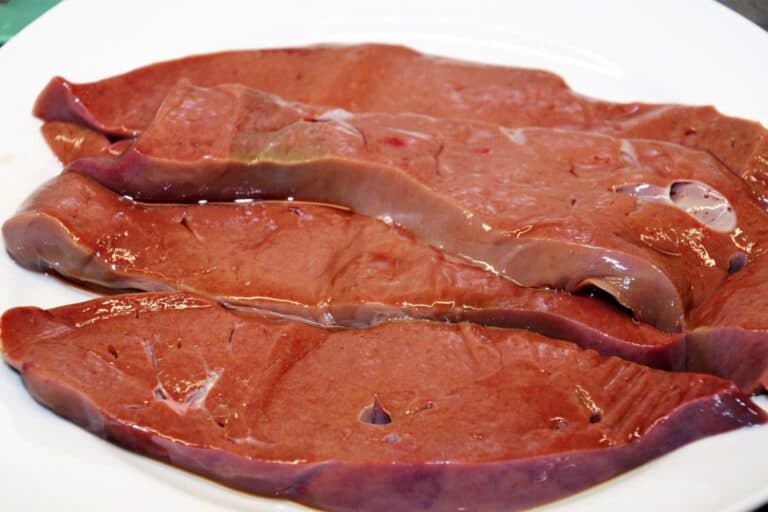 raw slices of liver on plate