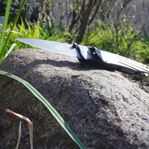 the Gerber Remix 2 knife on a rock
