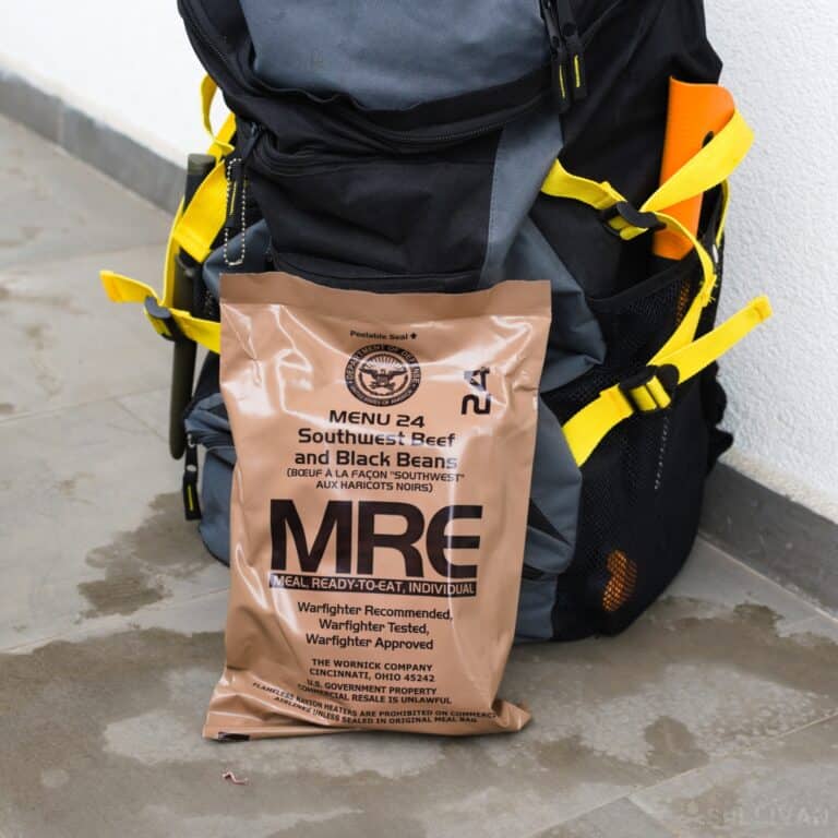 an MRE next to a bug out bag
