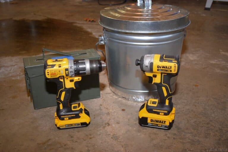 two hand drills next to ammo can and aluminum trash can