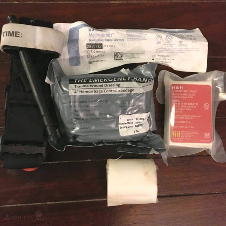 first aid kit worn on battle belt