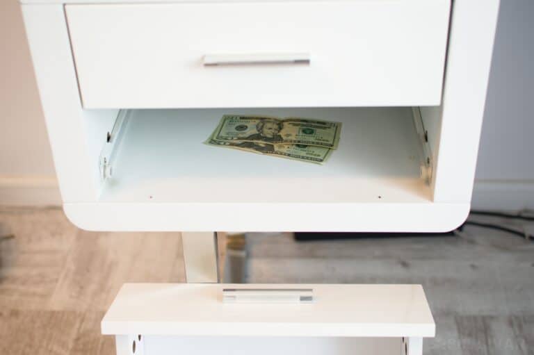 cash hidden under desk drawer