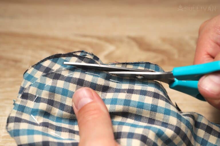 trimming excess fabric