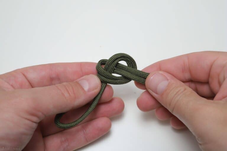 overhand knot turn working ends through loop
