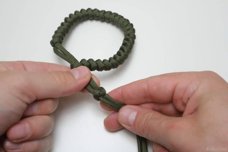 snake knot paracord bracelet snugging final knot