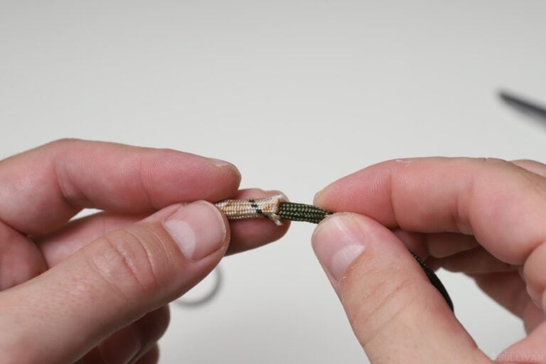 butterfly stitch keychain scoobie inserting piece of paracord into empty strand