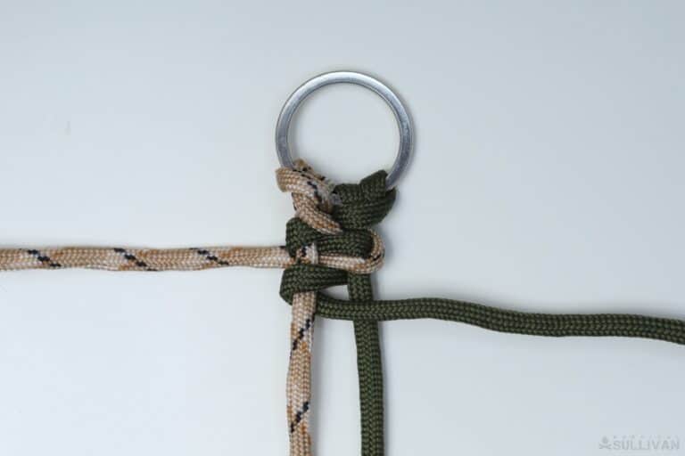 growling dog paracord keychain move first working cord to the right a second time