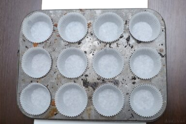 paper muffin cups inside muffin tin