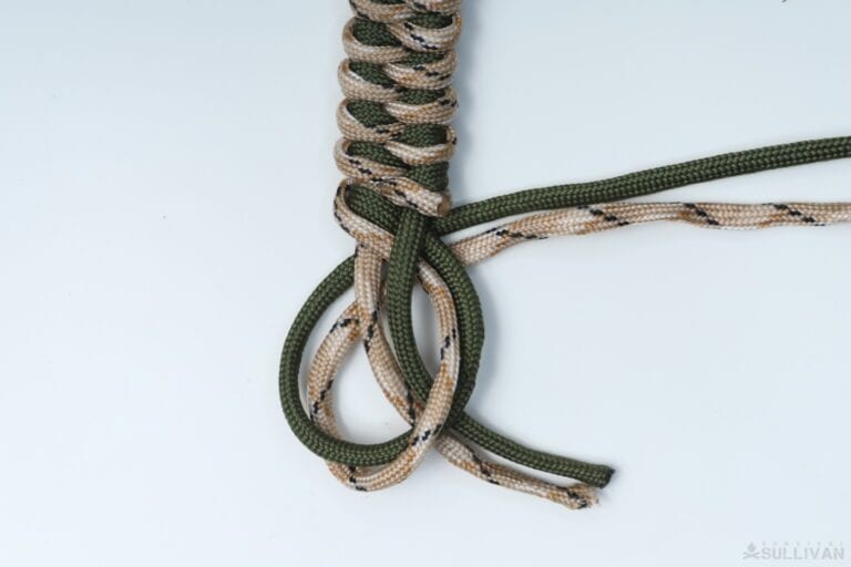 growling dog paracord keychain pass remaining ends through the loop