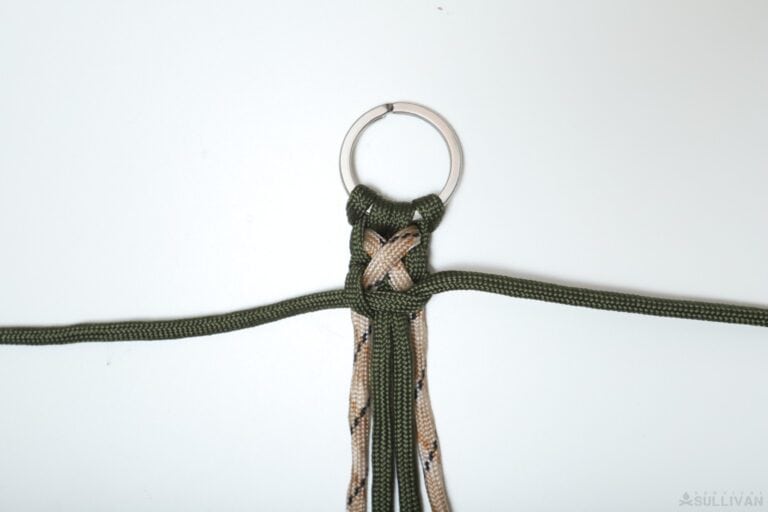 crisscross solomon paracord keychain snugging up the 3rd knot