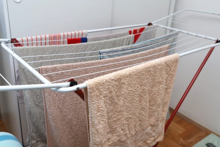 wet towels hanging indoors