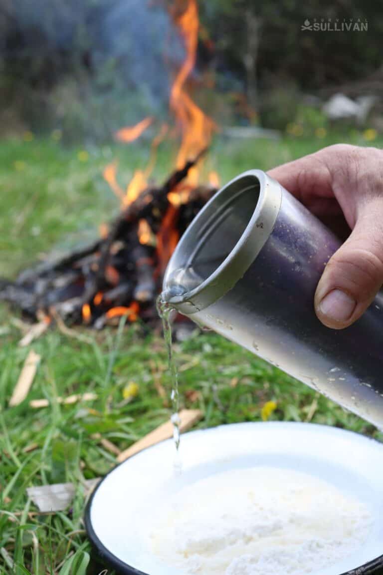 adding water to dough