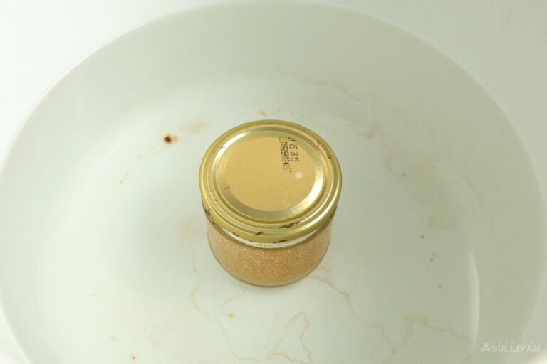 jar with gelatin inside saucepan with water