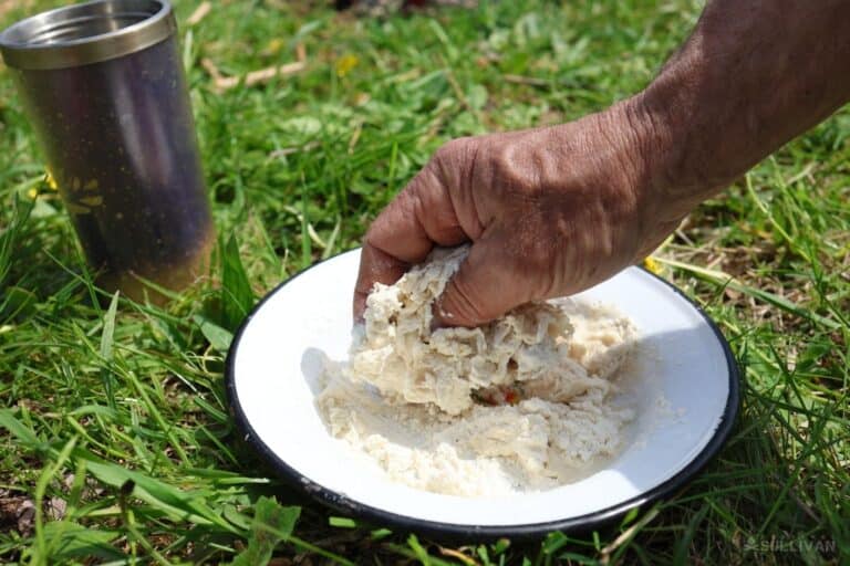 mixing dough with bare hands